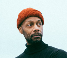 a man in an orange hat